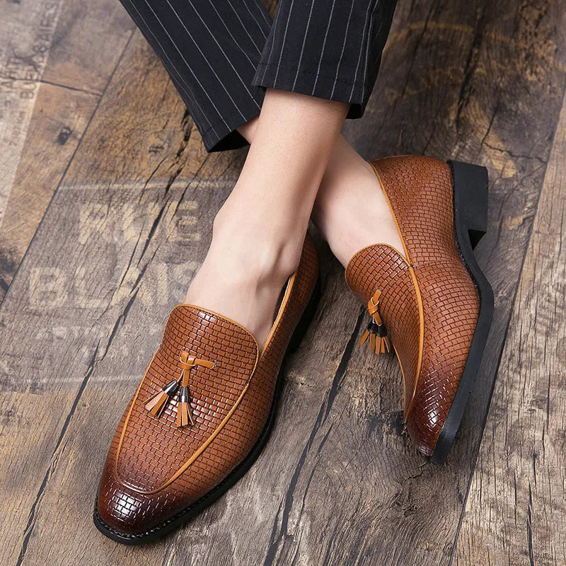 Men's black pointed toe slip on shoes with tassel detail on artificial PU upper
