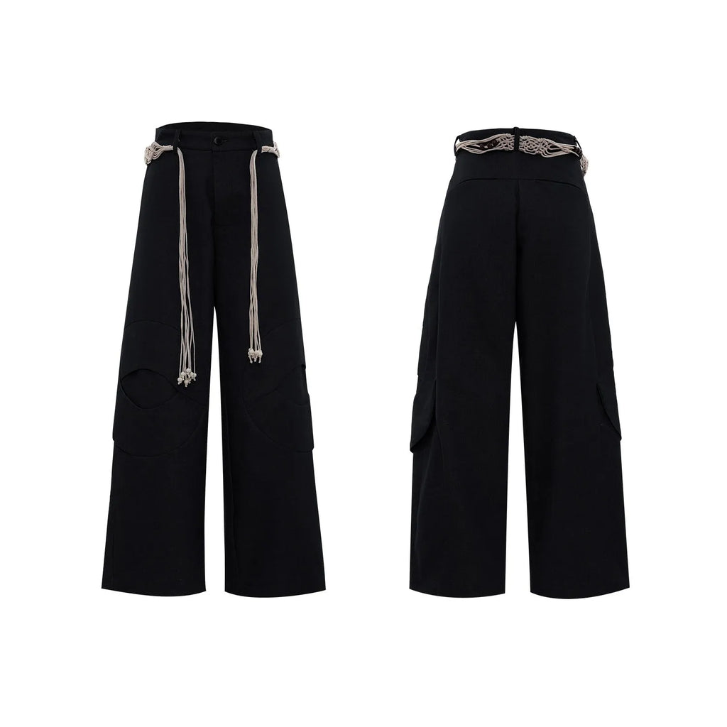 Men's dark blue straight-leg cotton jeans with 3D cutting, belt stitching, and decorative pocket tassels.