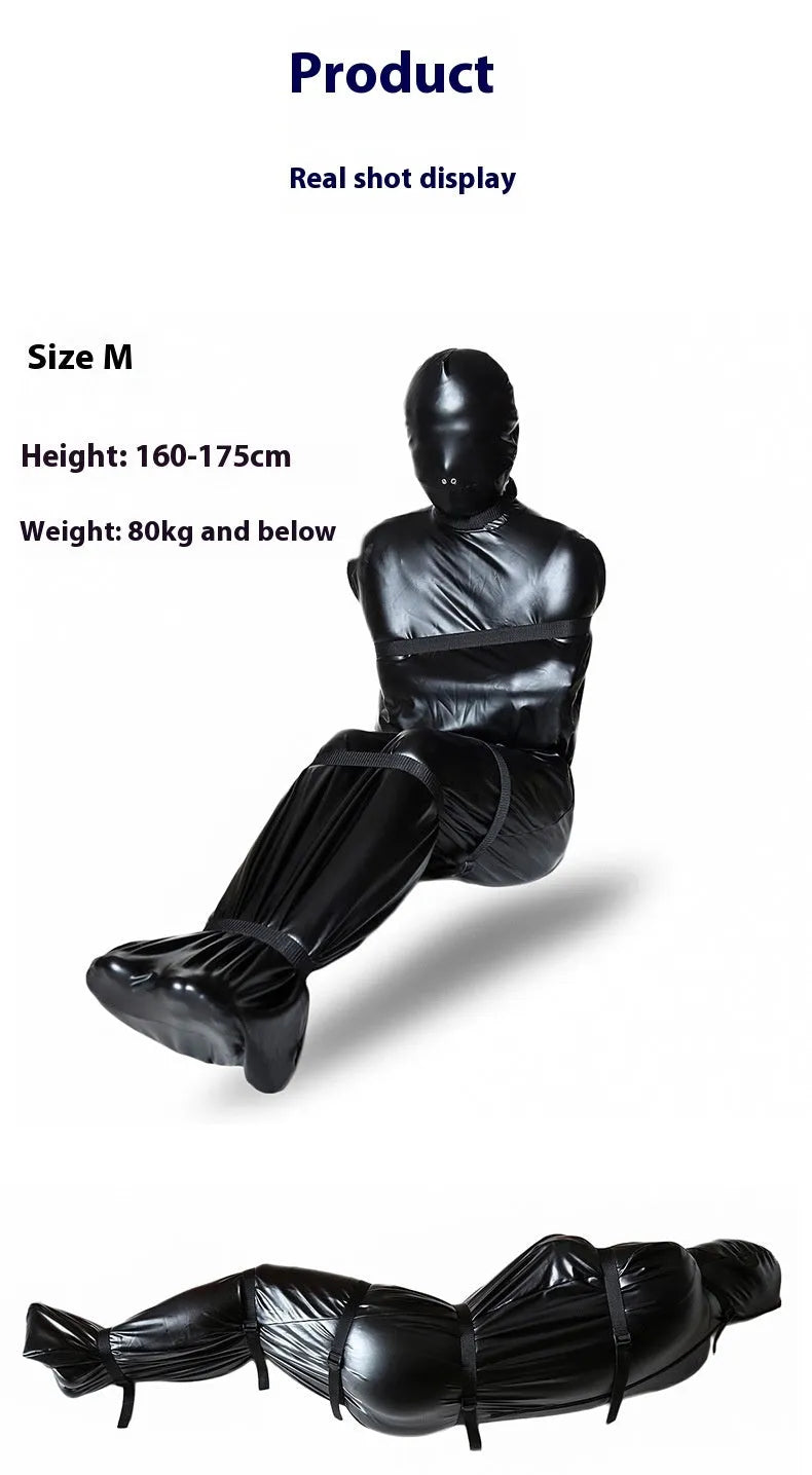 Black patent leather bondage suit with six ratchet tie down pieces for full body restraint