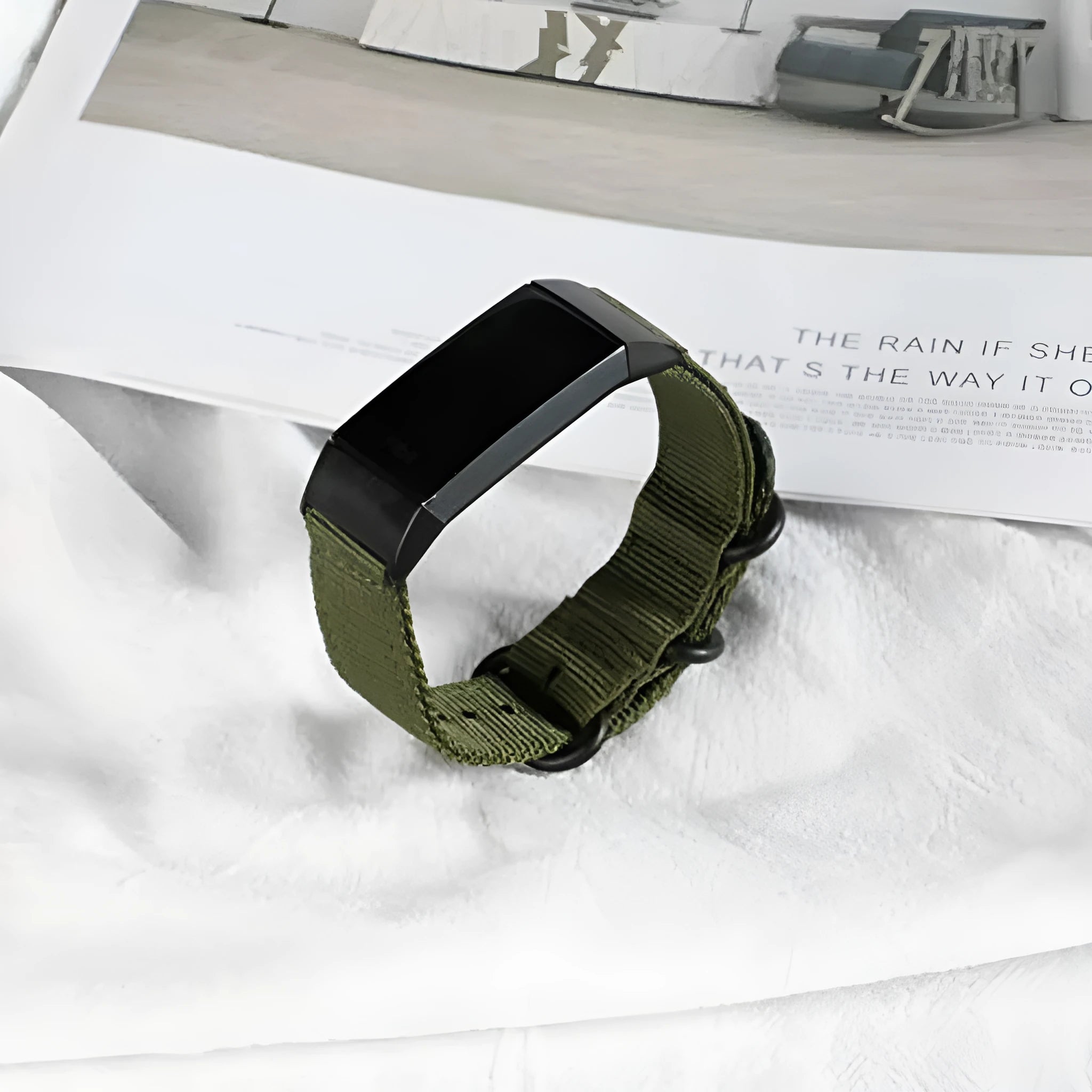 Nylon three-ring buckle replacement strap for Fitbit Charge 3 fitness tracker in multiple colours.