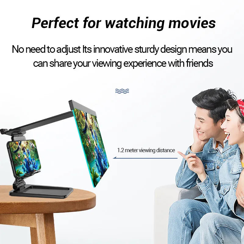 Black foldable mobile phone screen magnifier with detachable phone holder on a desk