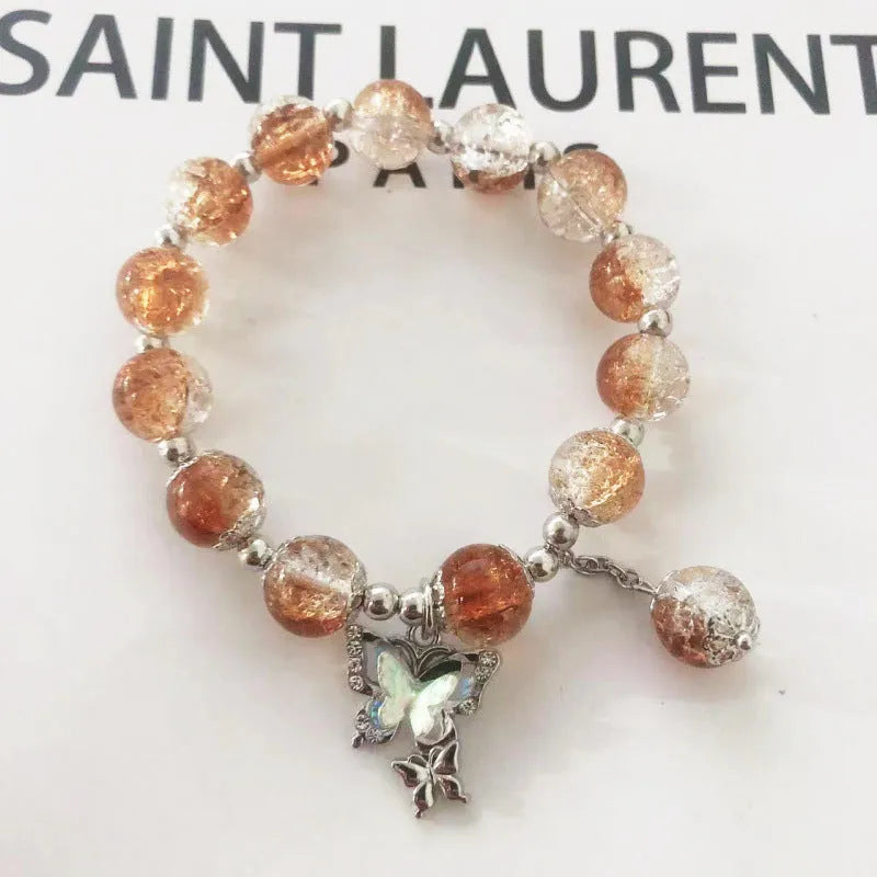 Handmade Chinese style glass bracelet with bamboo joint beads in a red Lvzhu Duobao design.