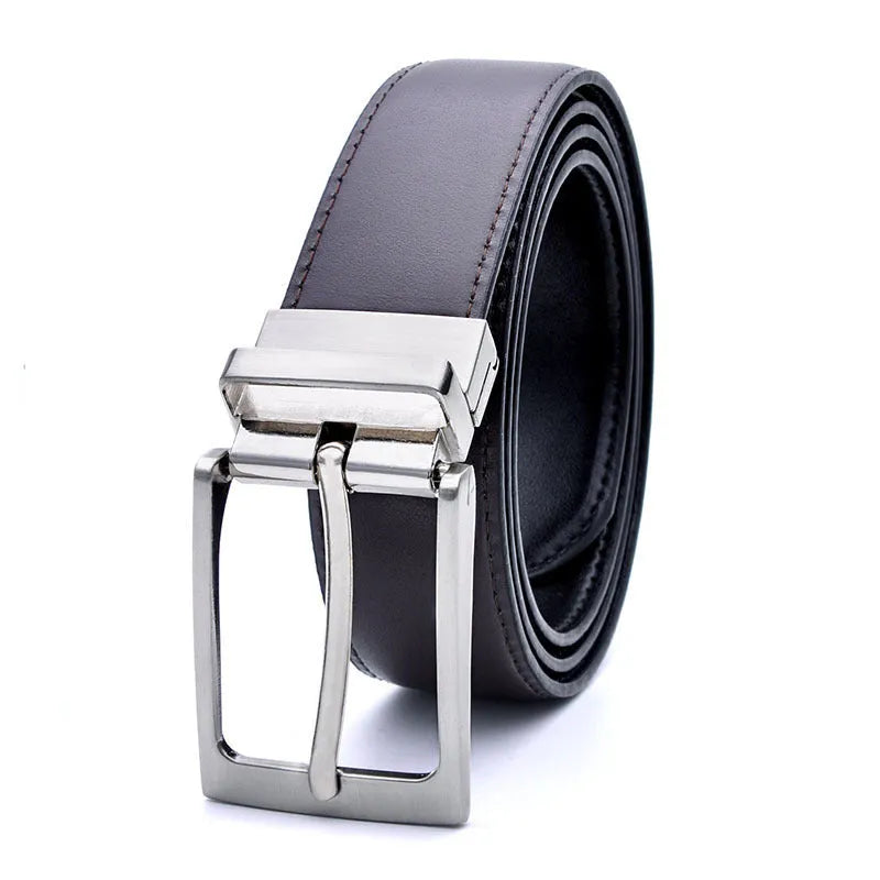 Men's brown and black genuine leather belt with rotating pin buckle on dark background