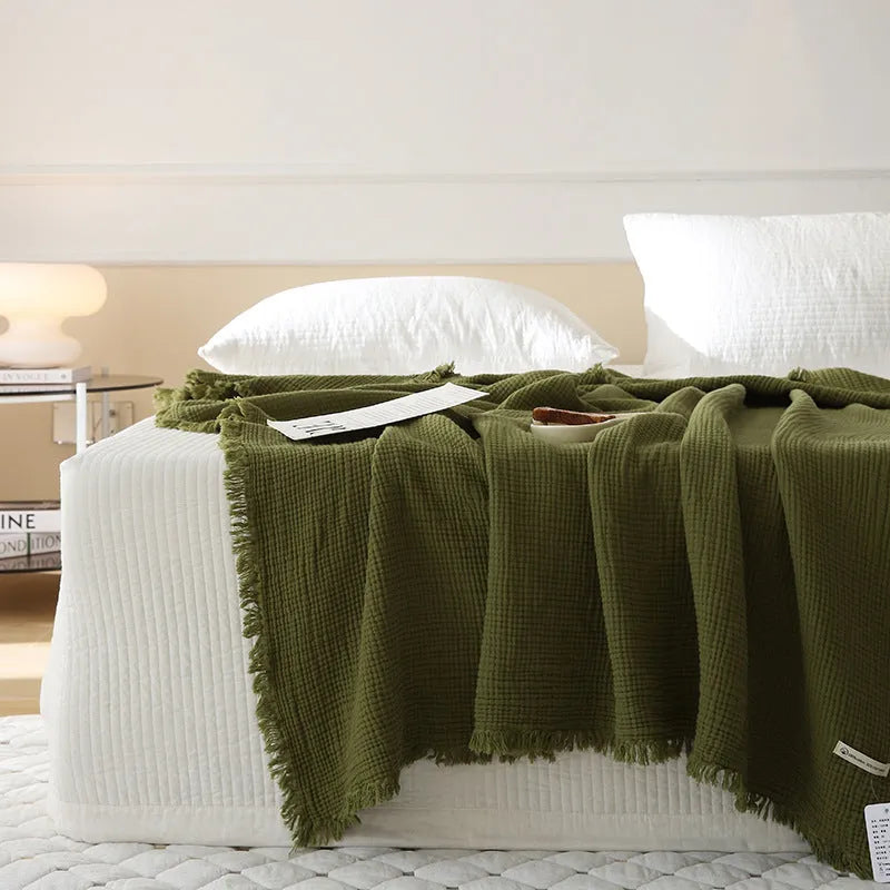 Four-layer gauze cotton blanket with tassel trim in navy blue colour