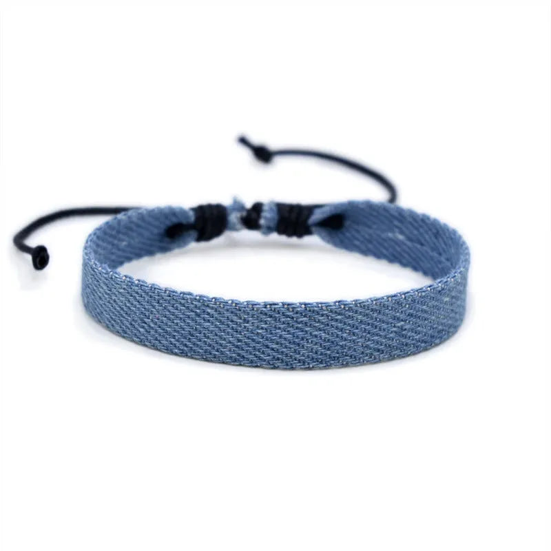 National style denim fabric unisex bracelet carrying strap in a selected colour.