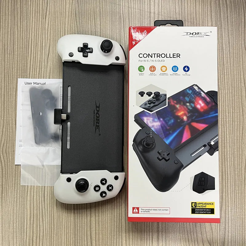Black and white Nintendo Switch gamepad handle with console inserted, showing button layout and USB-C charging port