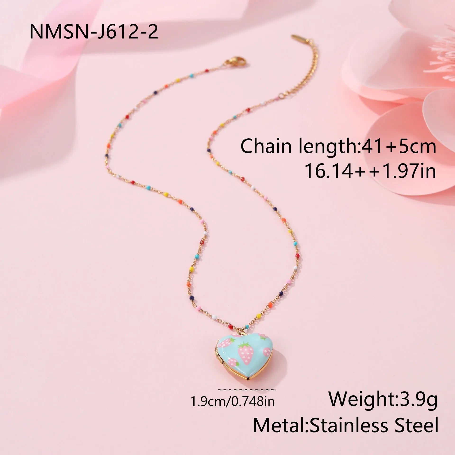 Gold-plated heart-shaped fruit pendant necklace on a stainless steel chain, showing grape design detail.
