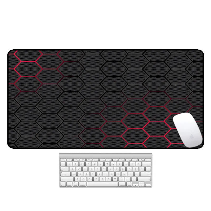 Large thermal transfer printed mouse pad with natural rubber non-slip base on a desk.
