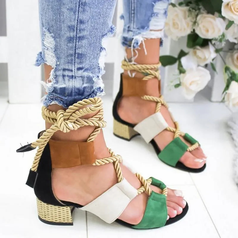 Women's beige suede sandals with a chunky heel, colour-block panels, and an ankle strap.
