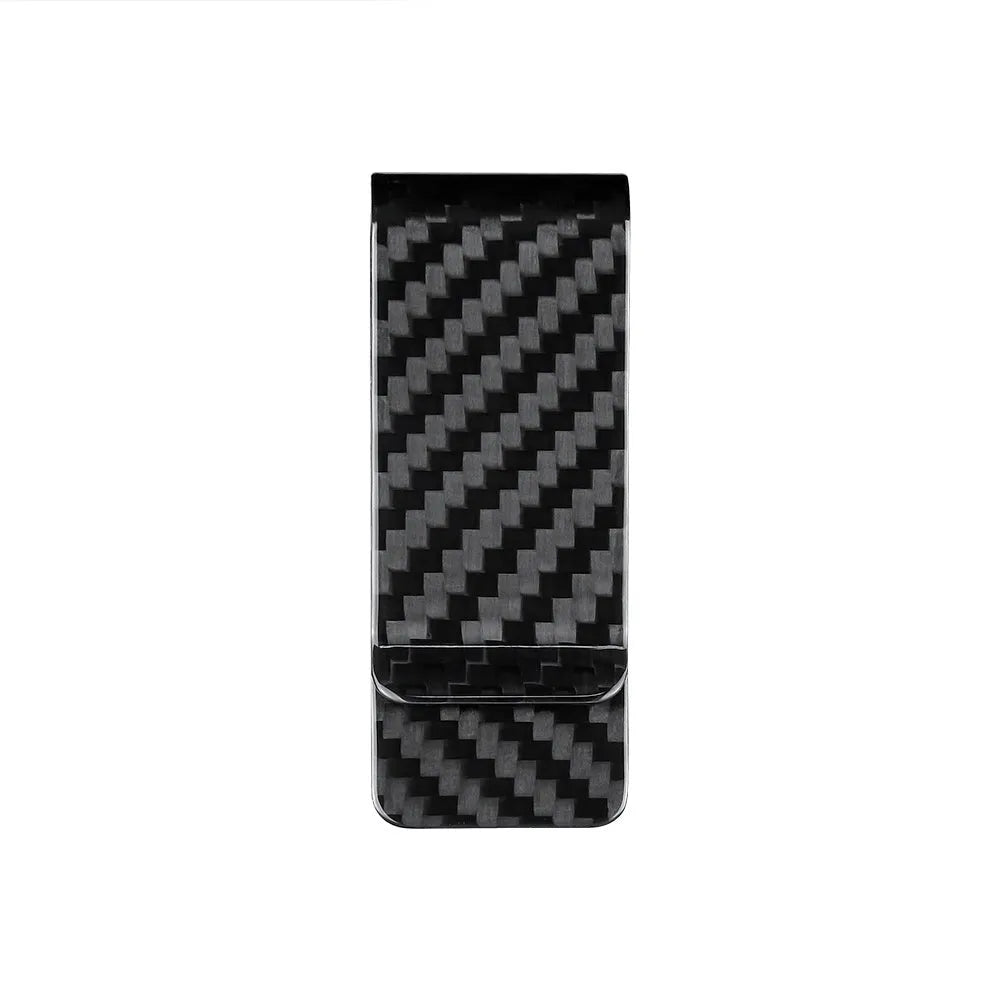 Black genuine carbon fiber money clip with striped glossy surface on a plain background