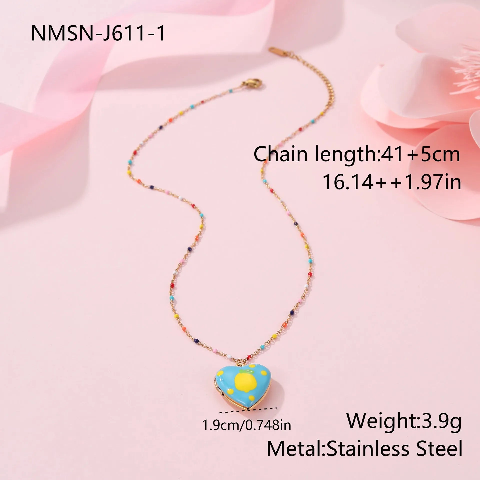 Gold-plated heart-shaped fruit pendant necklace on a stainless steel chain, showing grape design detail.