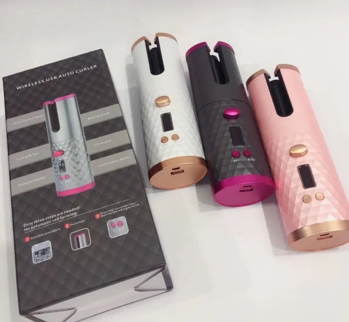 Portable wireless curling iron with USB charging port and gold ceramic barrel in pink colour