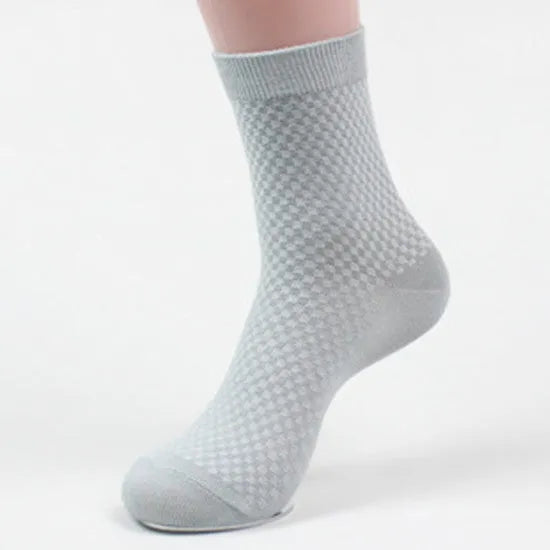 Men's bamboo fibre socks showing small square pattern in one of five available colours.