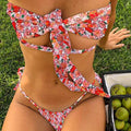 Women's wireless cup swimsuit with chest pad support and lace-up front design in floral print