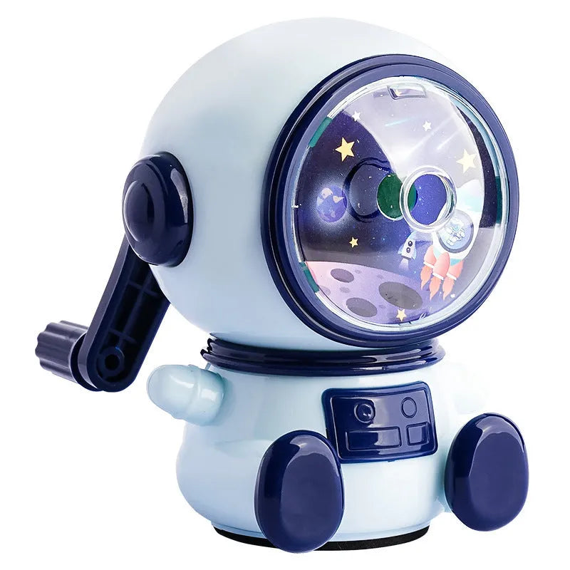 Blue astronaut-themed manual pencil sharpener with adjustable dial showing three sharpening levels