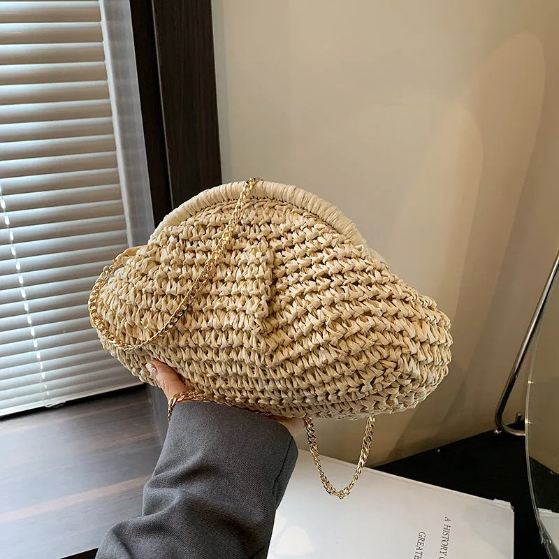Shell-shaped straw shoulder bag for women with chain accents and polyester lining