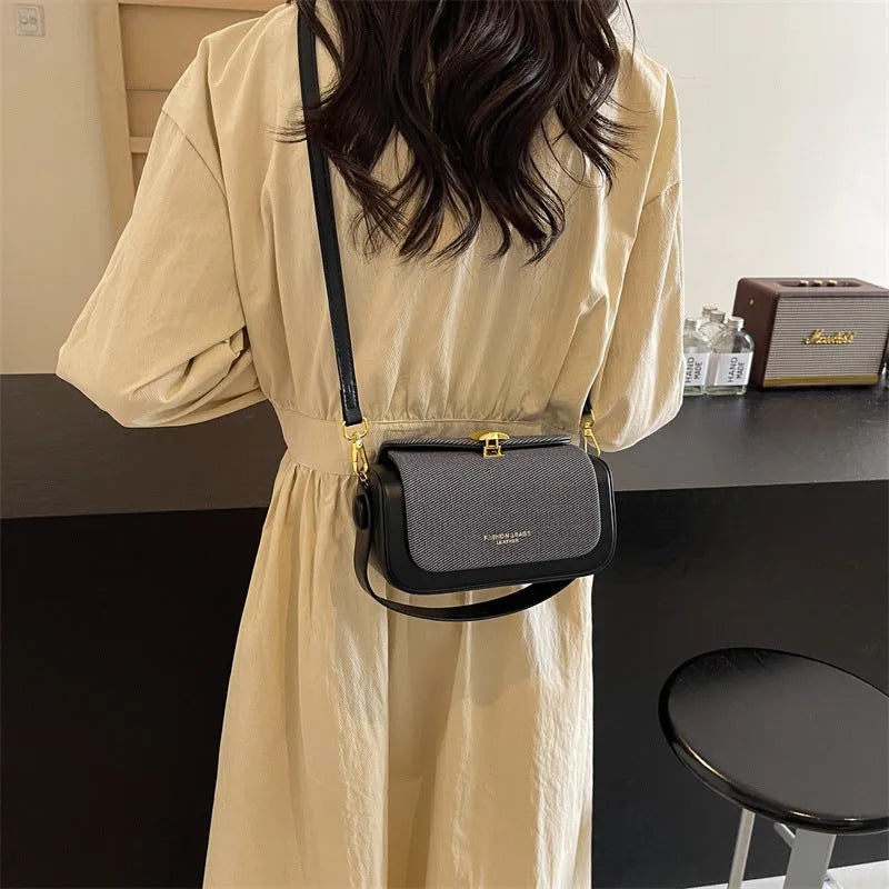 Women's black PU messenger bag with horizontal square shape and crossbody strap