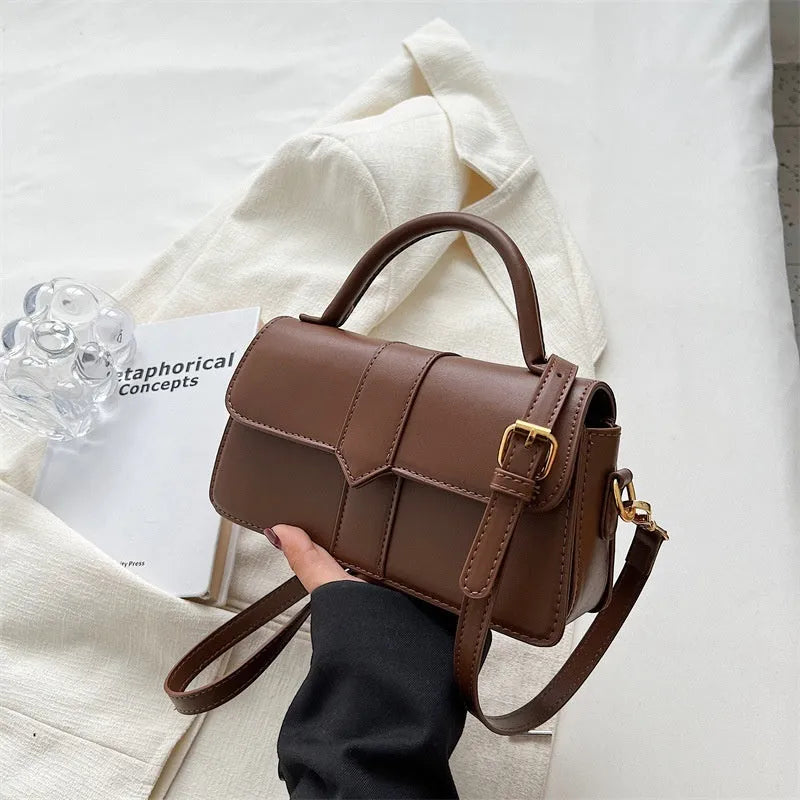 Women's beige PU leather horizontal square messenger bag with crossbody strap and external pocket