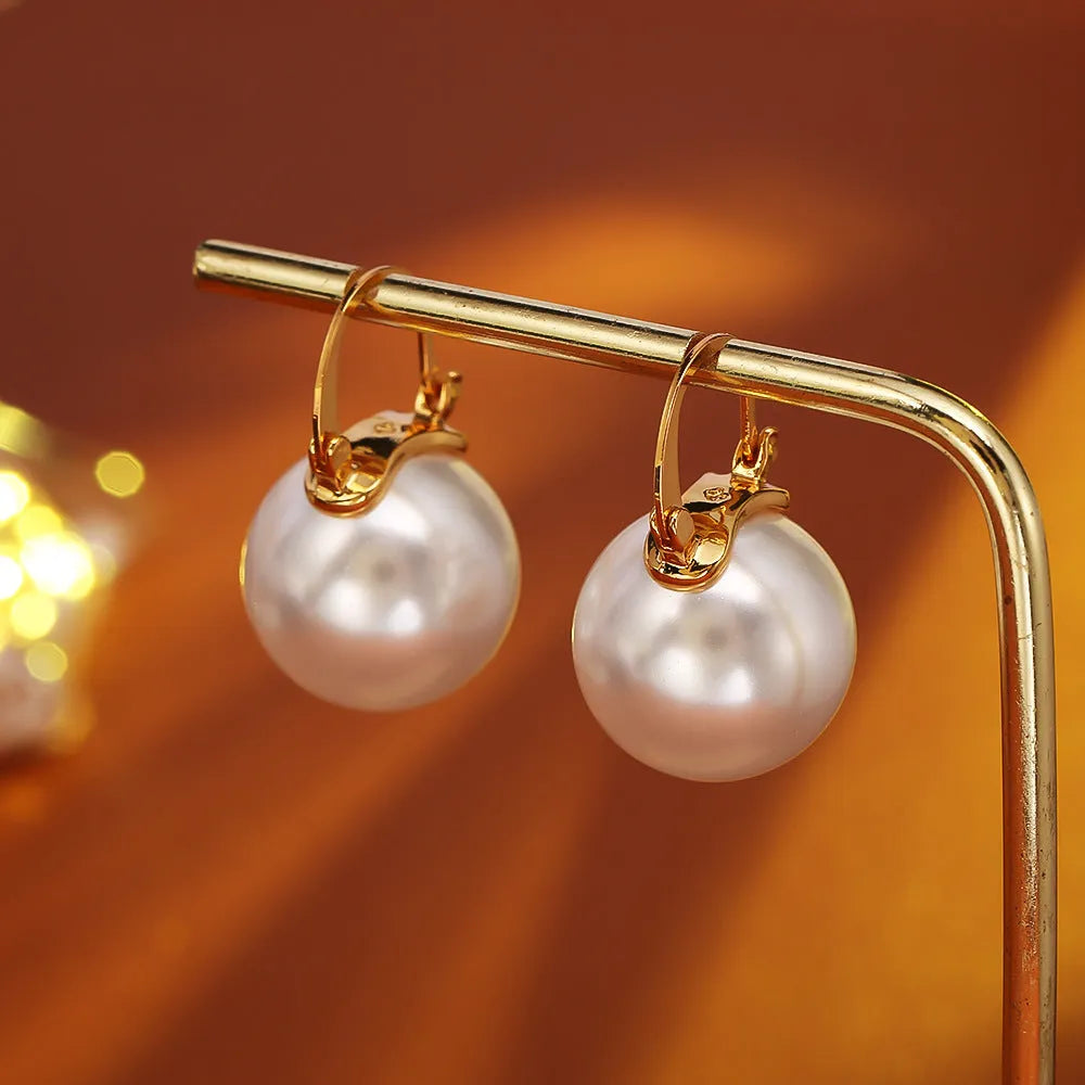 Women's real gold plated round pearl earrings on copper base