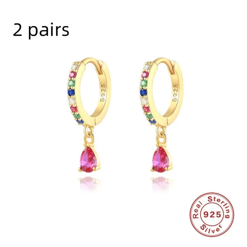 Geometric water drop earrings in Sterling Silver with electroplated gold finish and purple diamond stones