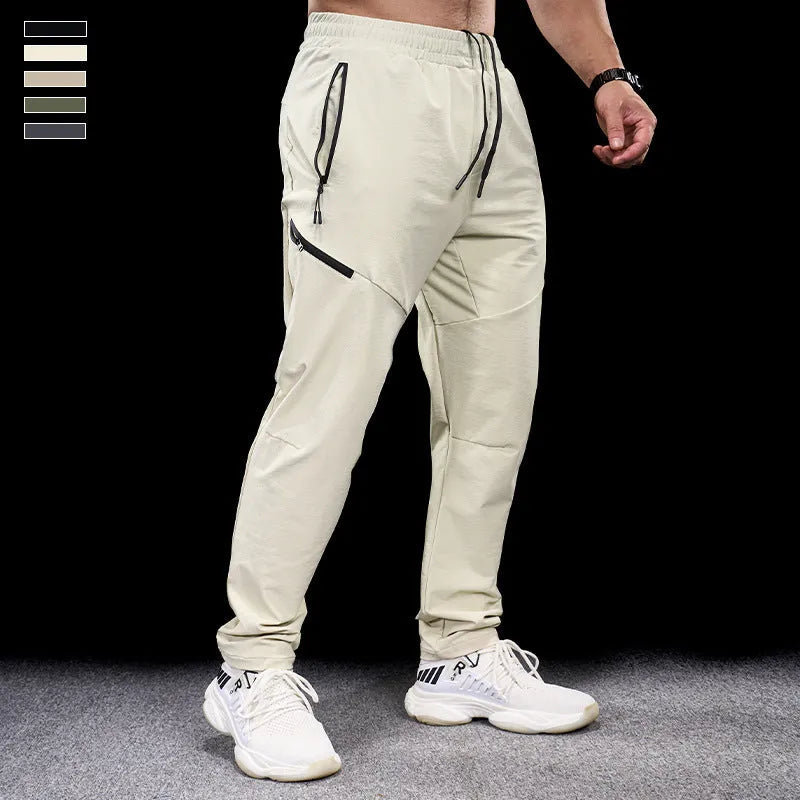 Men's black waterproof quick-drying nylon workout trousers for sports and exercise