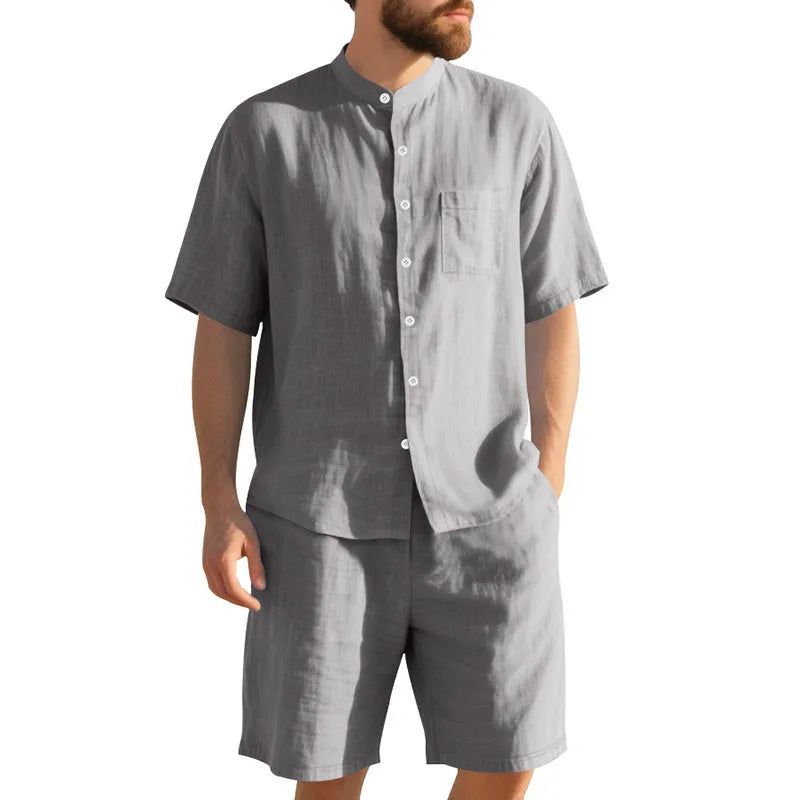 Men's light blue linen-blend summer suit with short sleeve shirt jacket and matching shorts on a hanger.