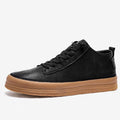 Men's black and white leather casual shoes with rubber soles and lace-up closure
