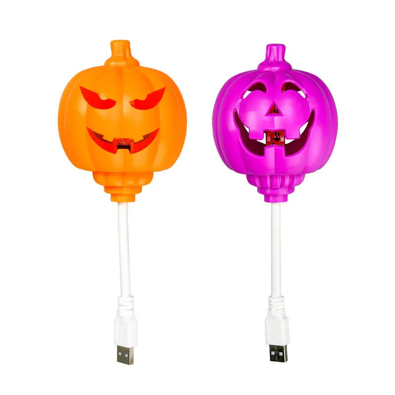 Plastic pumpkin lamp with USB cable for seasonal decoration in yellow or purple light