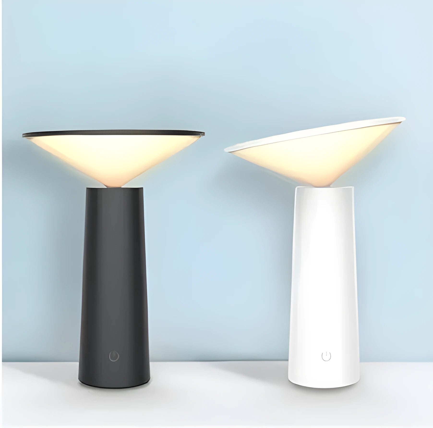 Black and white USB rechargeable LED desk lamp with a touch sensor and adjustable lamp head.