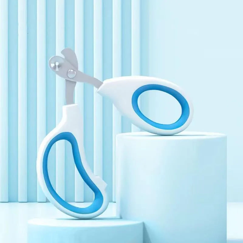 Blue cat nail clippers with circular safety hole and cushioned non-slip handle.