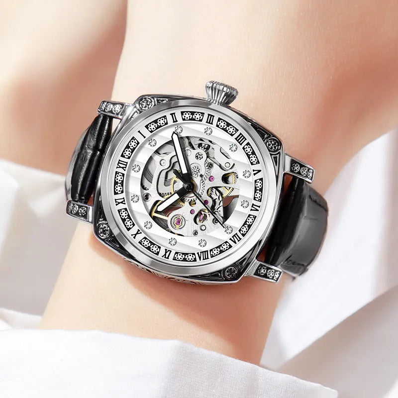 Men's mechanical wristwatch with a leather strap and luminous hands on a dial, shown in one of four colour options.