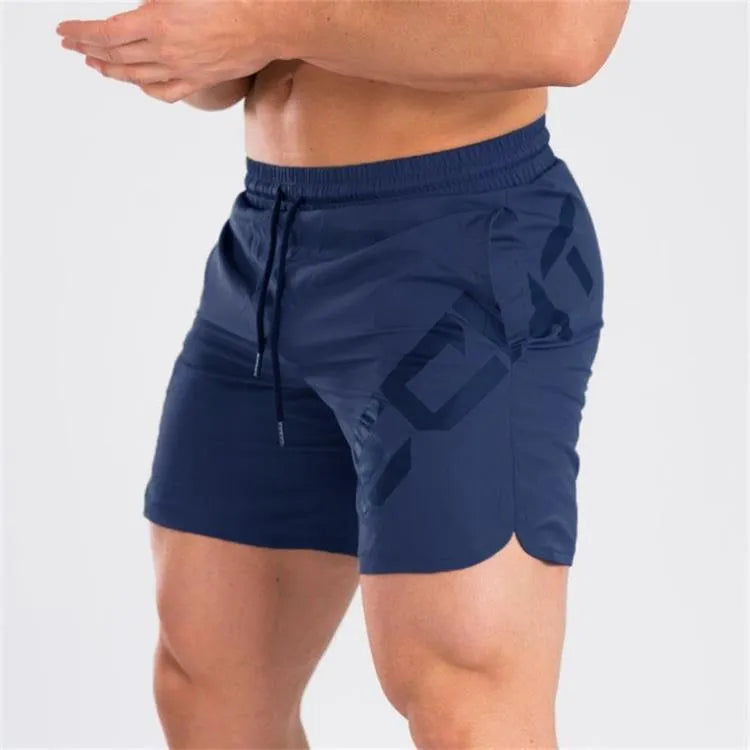 Men's black elastic waist knee-length quick-dry training shorts on a white background.