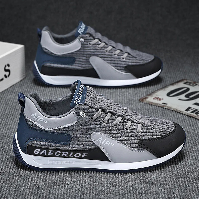 Men's green and grey mesh running shoes with viscose soles and lace-up fastening