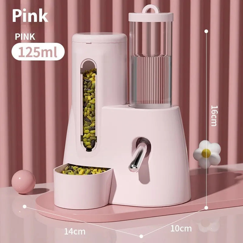 A white, blue, or pink plastic automatic water feeder and food basin for hamsters, available in large or small size.
