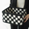 Checkerboard pattern woven felt storage basket showing 37×29×19.5cm dimensions and folding design
