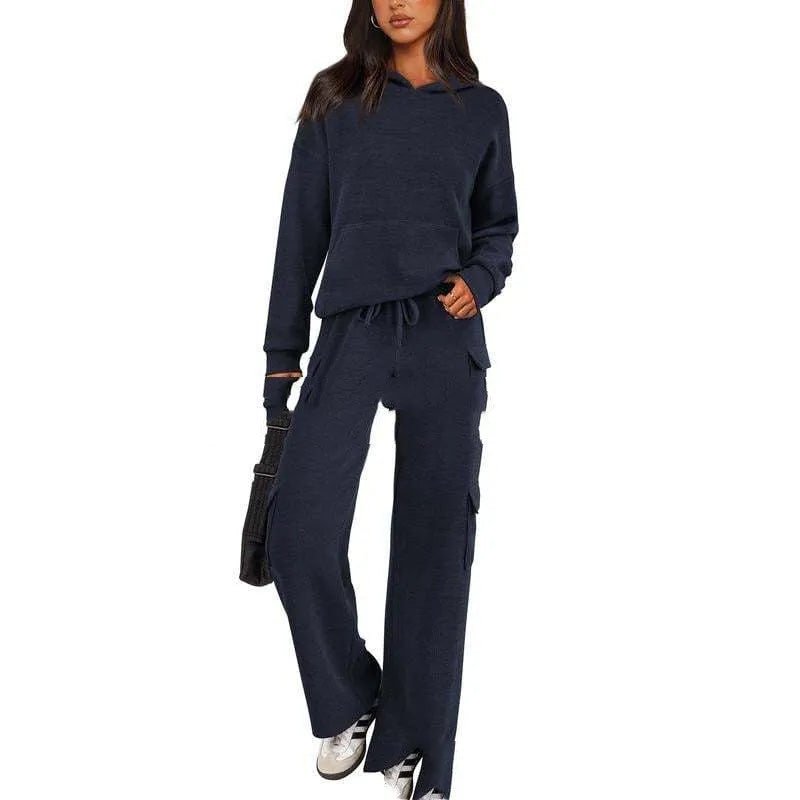Women's polyester leisure sports suit set showing long sleeve top and matching trousers in multiple colour options