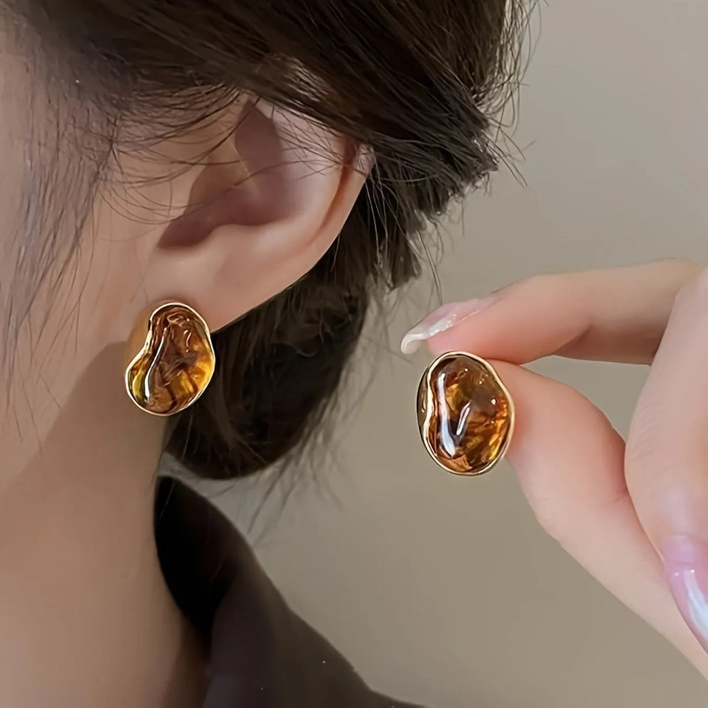 Three pairs of handmade geometric holiday earrings with electroplated alloy and tassel decorations