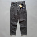 Men's straight-leg cotton casual trousers in khaki colour, laid flat to show mid-waist and straight cut.