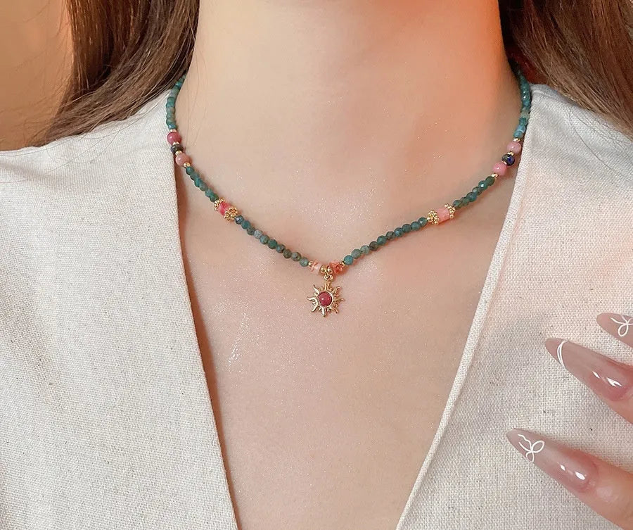 Freshwater pearl necklace with geometric stone sun pendant on clavicle chain