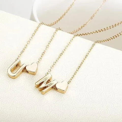 Peach heart shaped letter necklace pendant in gold and silver alloy colours