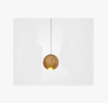 Nordic style solid wood ball chandelier with wooden spheres hanging from a wood disc ceiling plate.