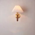 American retro style wall lamp with fabric shade and wooden frame in bedside setting