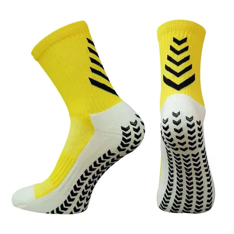 Men's mid-calf athletic socks with geometric patterns and non-slip silicone grips