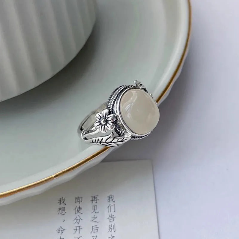 Adjustable copper vintage ring with imitation white chalcedony and antique finish