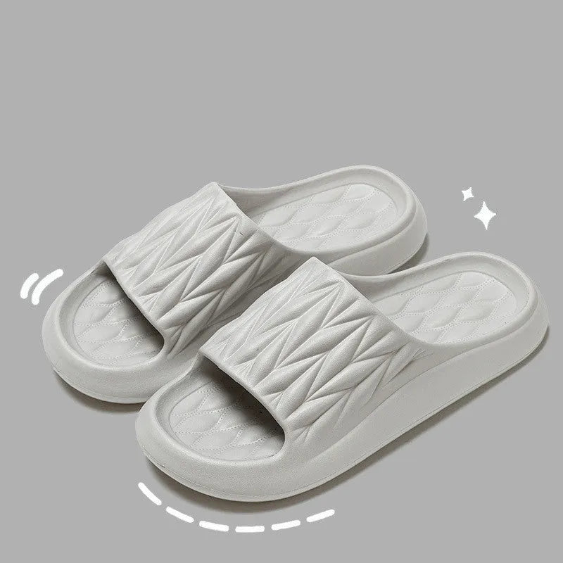 Leaf texture design EVA indoor slippers in multiple colours on a white background.