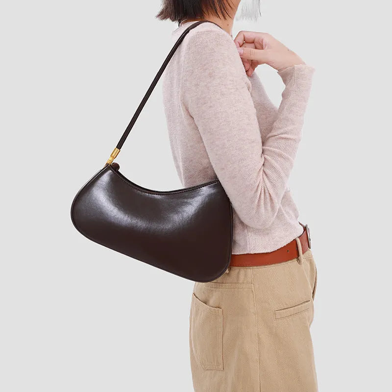 Women's oval retro underarm bag in PU leather with single strap and sewing line detailing