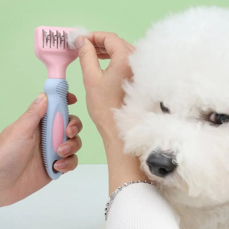 Pink stainless steel pet grooming comb with knot knife on a 170mm long handle.