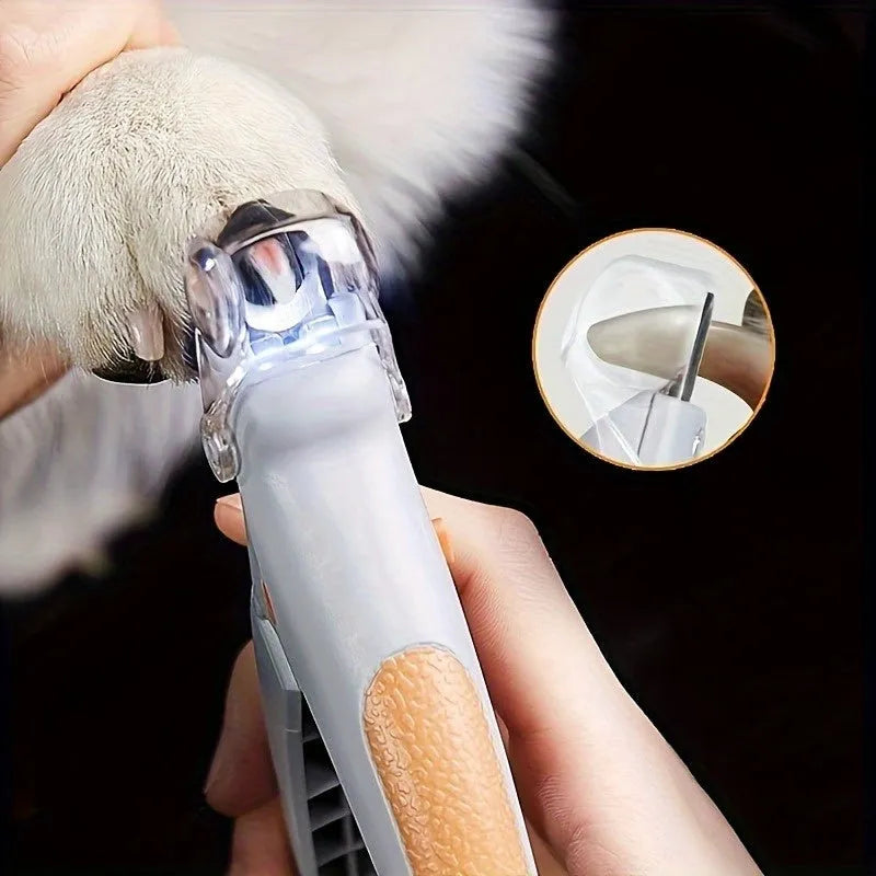 Yellow LED pet nail trimmer with magnifying glass for cats and dogs on a white background.