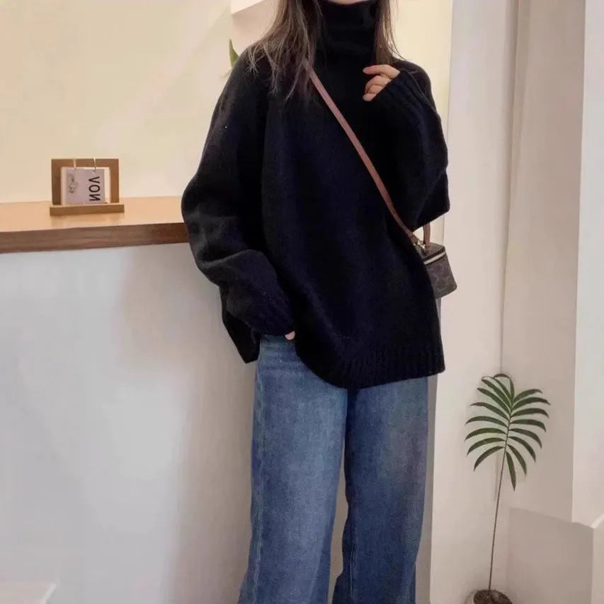 Women's loose red turtleneck sweater with thick curling pile collar, casual style.