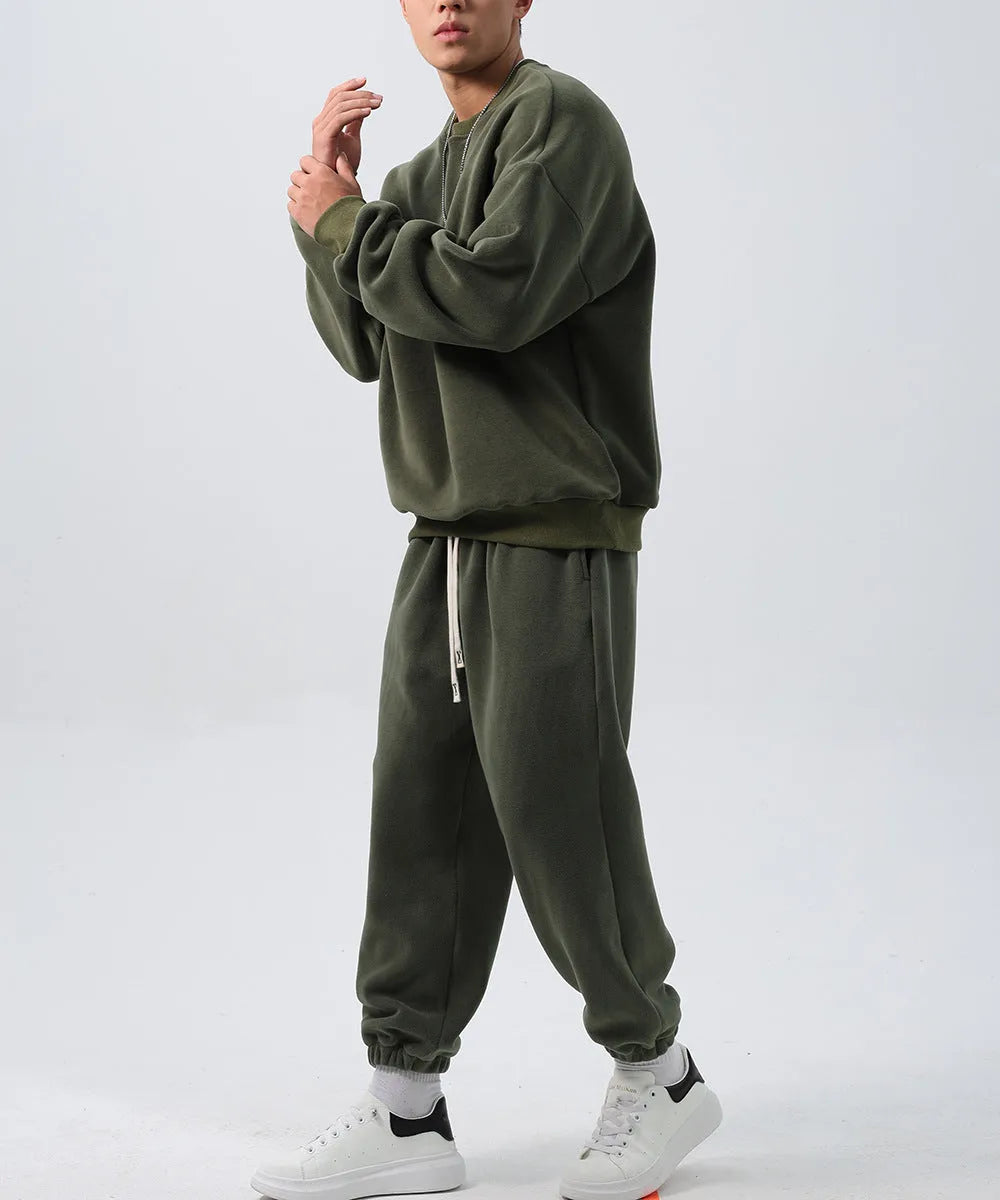 Men's polar fleece winter sports suit in five colour options showing crew neck top and matching trousers